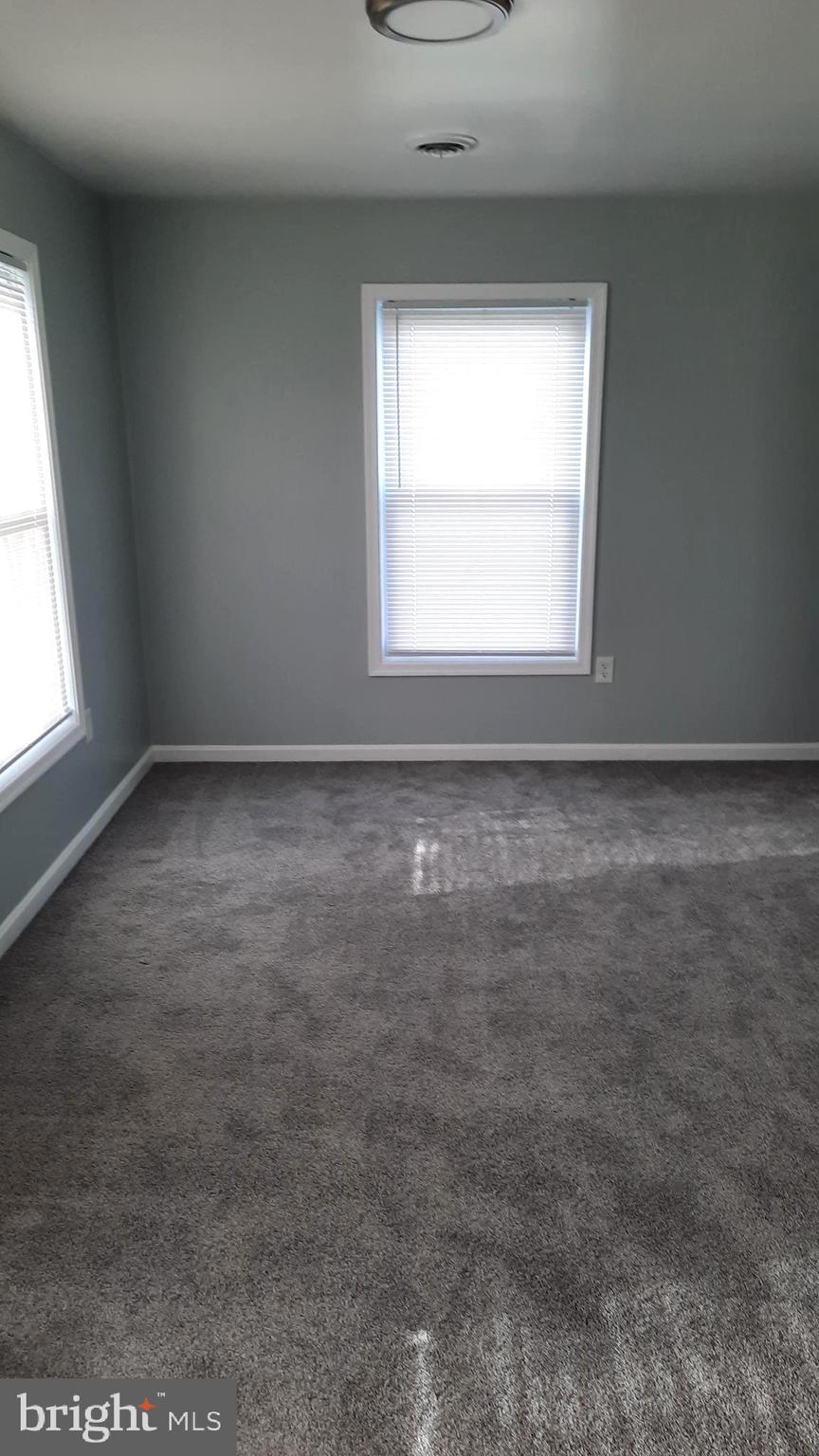 618 Colonial View Road Mechanicsburg, PA 17055 - Photo 18 of 23 an empty room with a window