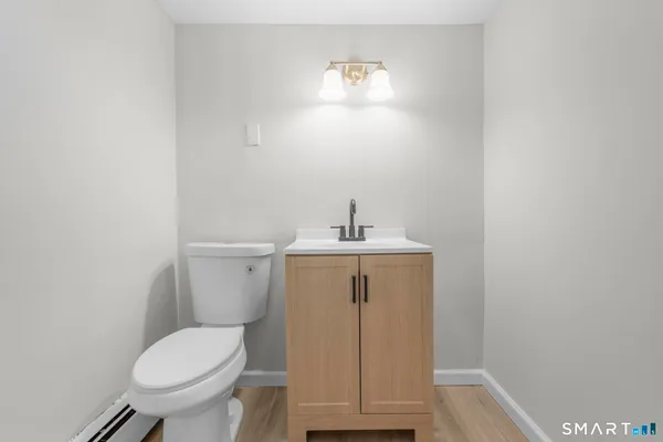 a bathroom with a sink and a toilet