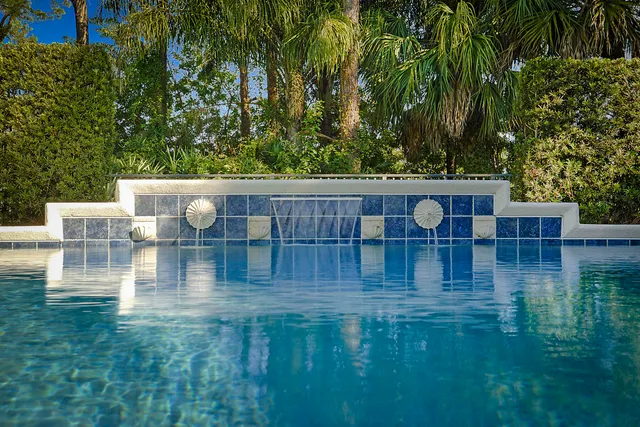 a view of a house with a swimming pool