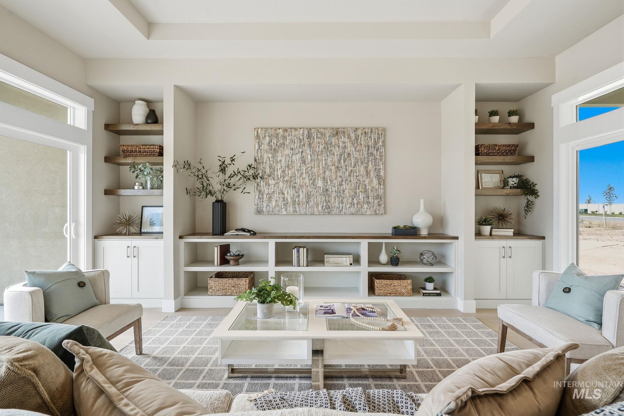 470 South Radiator Way Boise, ID 83716 - Photo 14 of 50 Recessed built-in shelving with wood-finish accents, integrated cabinetry, and a coffered ceiling
