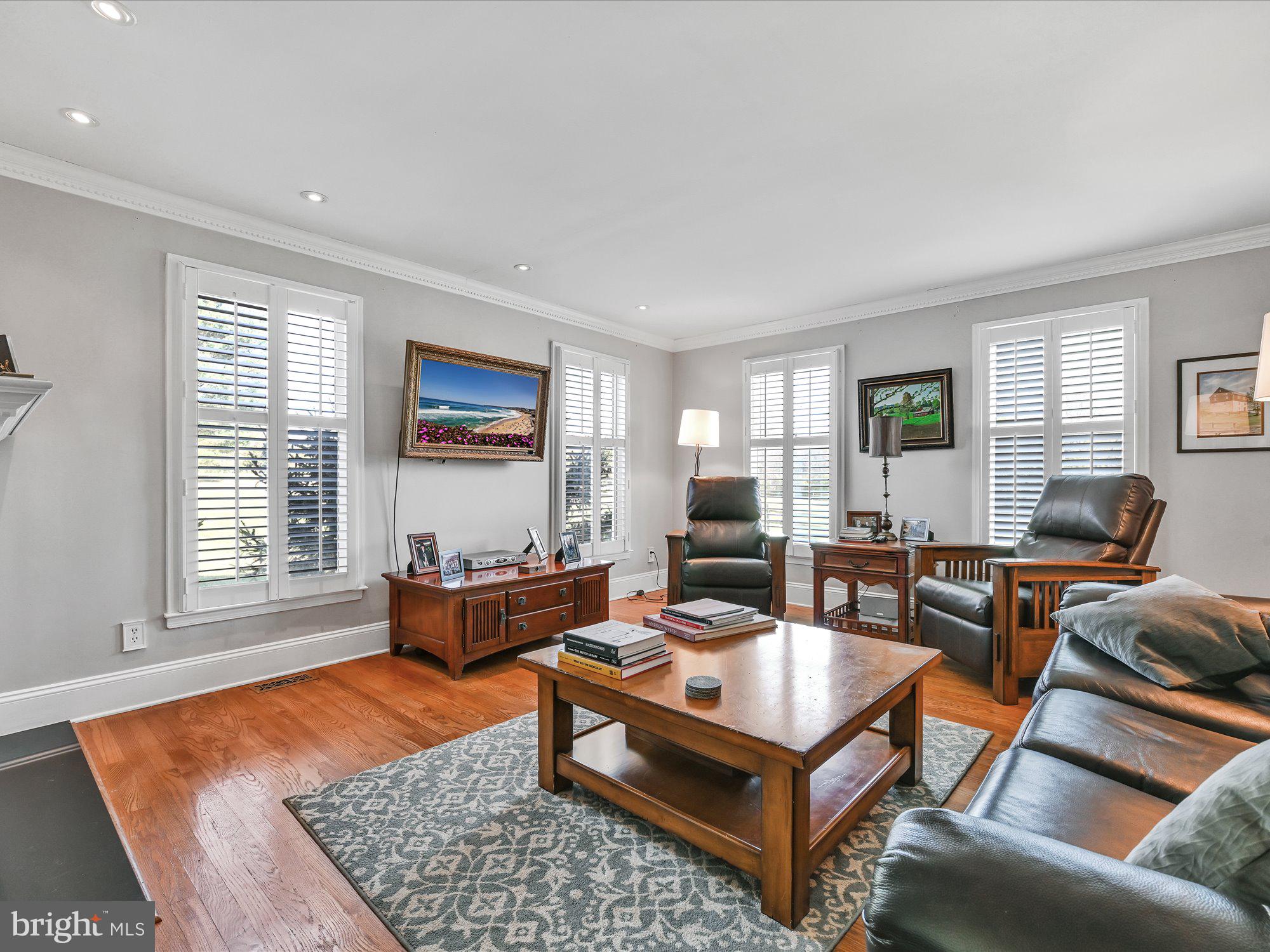 15 McLeod Pond Road Glenmoore, PA 19343 - Photo 12 of 57 Family room with custom Plantation Shutters