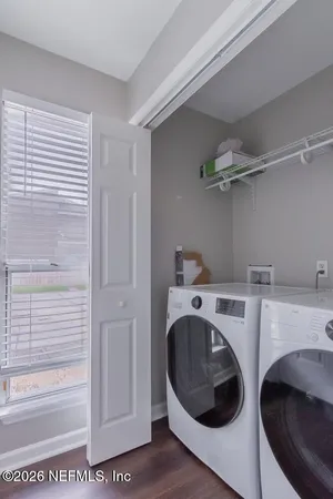 a utility room with dryer and washer