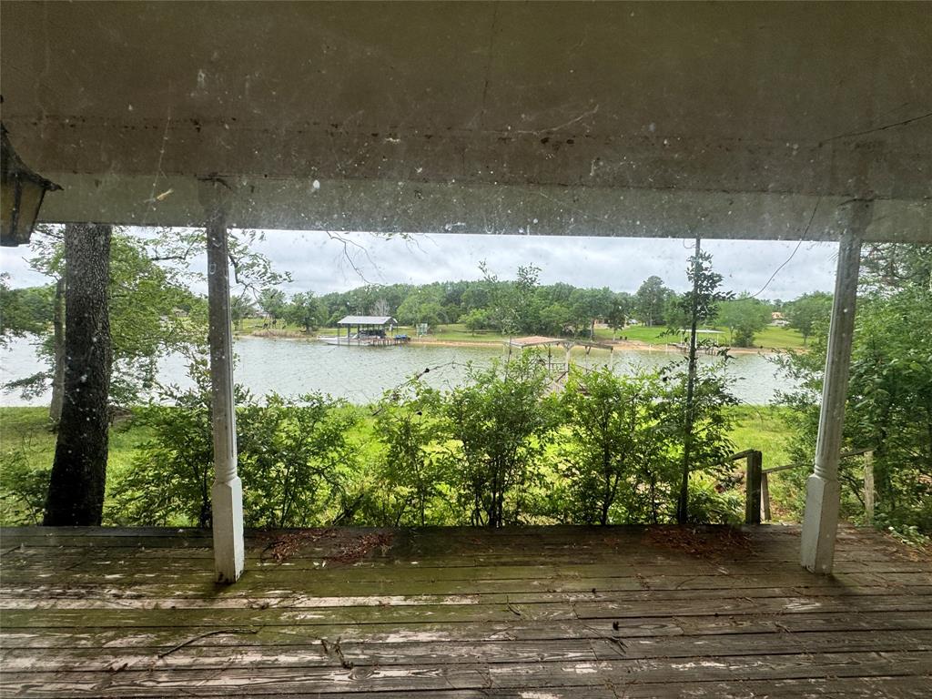 3909 Smothers Road Caney City, TX 75148 - Photo 29 of 35 a view of a lake with a big yard