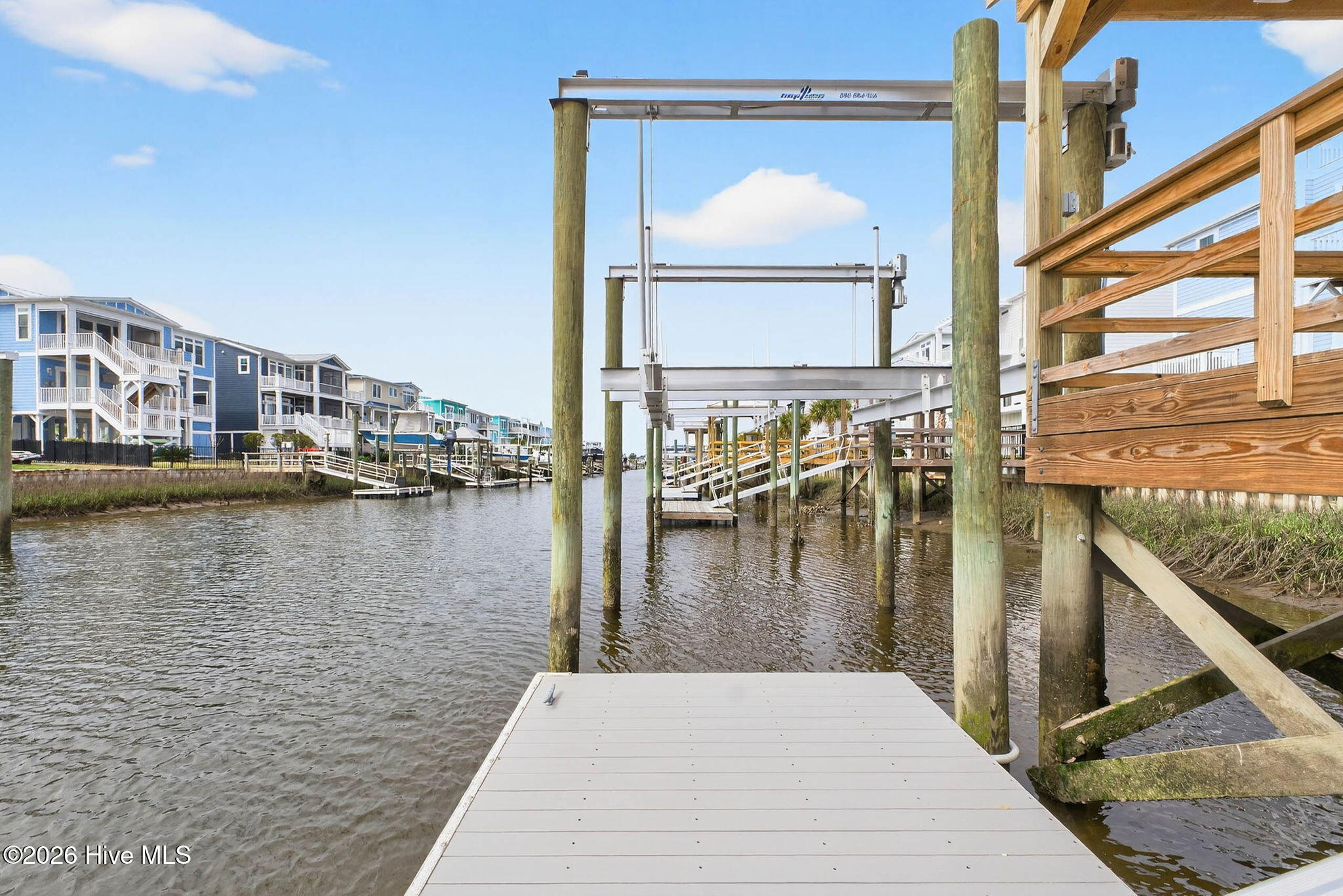 1416 Riverside Drive Sunset Beach, NC 28468 - Photo 59 of 83 Private boat dock with lift providing easy access to the ICW and surrounding coastal waterways.