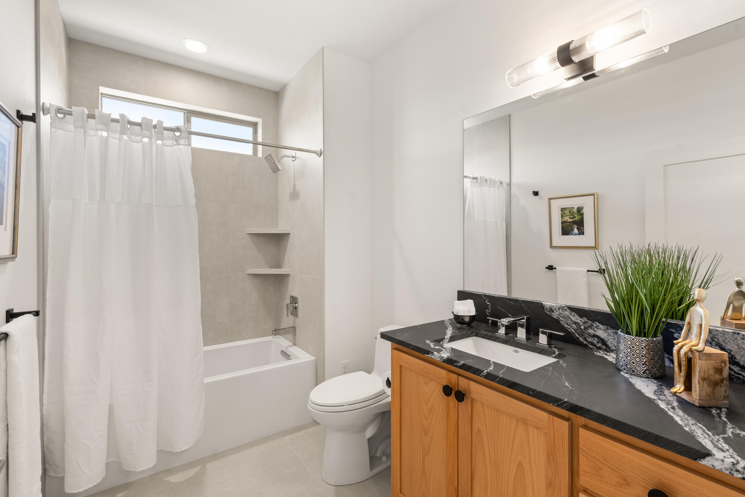 3060 Ashland Mine Road Talent, OR 97540 - Photo 28 of 43 a bathroom with a granite countertop sink toilet a large mirror a shower and a bathtub