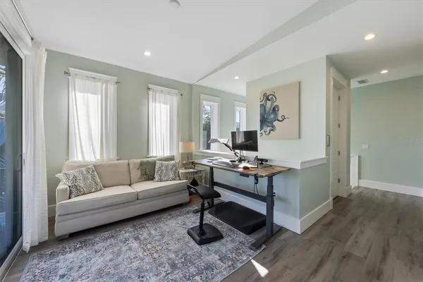 a view of swimming pool with outdoor seating