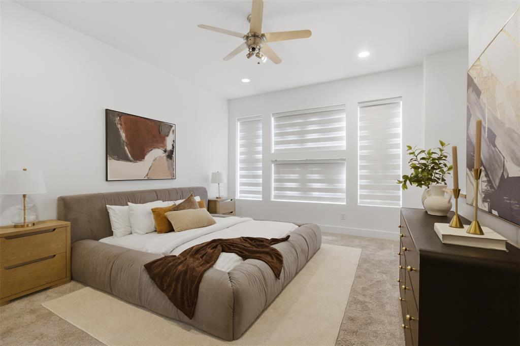 2111 Clark Street, Unit H Dallas, TX 75204 - Photo 2 of 37 a bedroom with bed and a window