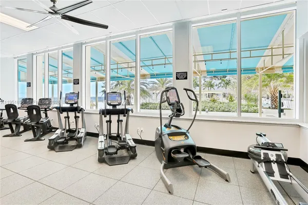 a kitchen with a table and chairs in it
