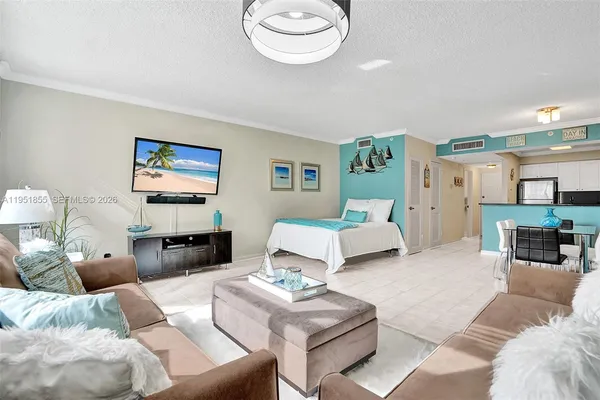 a living room with furniture and a table