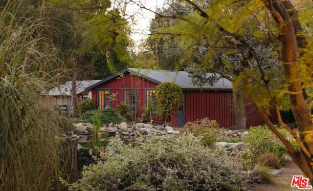 a view of swimming pool with chairs