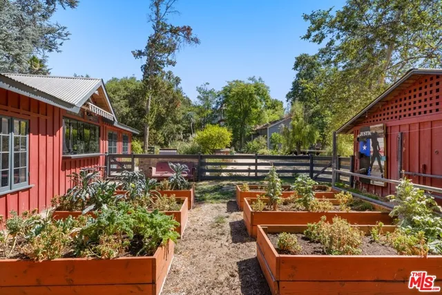 a kitchen with stainless steel appliances granite countertop a stove and cabinets