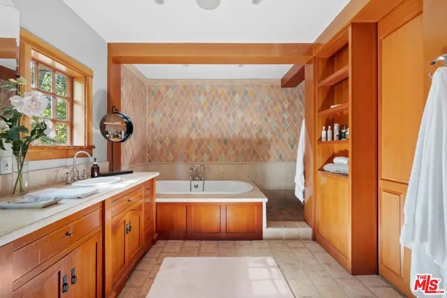 a living room with furniture or fireplace and a table