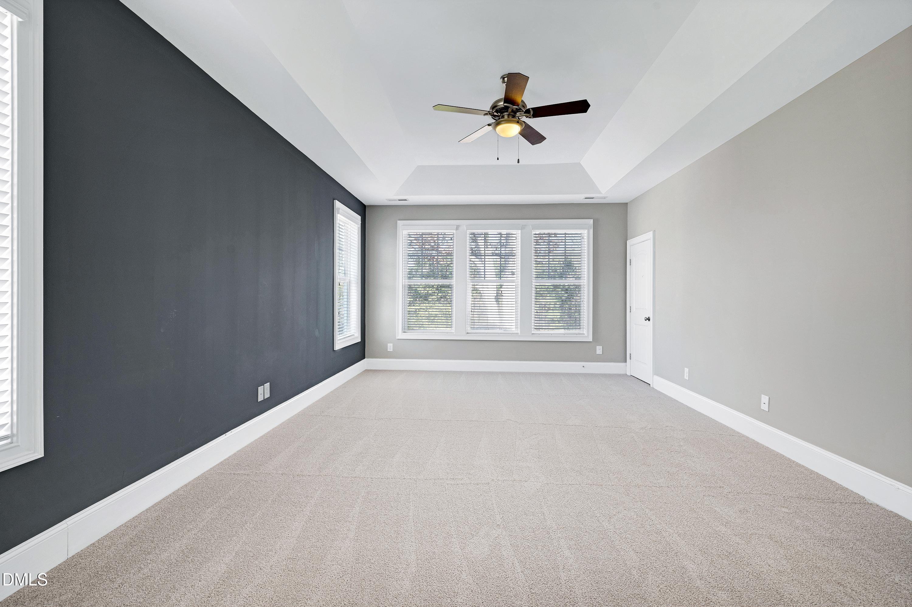 212 Mystic Pine Place Apex, NC 27539 - Photo 23 of 67 a view of an empty room with a window