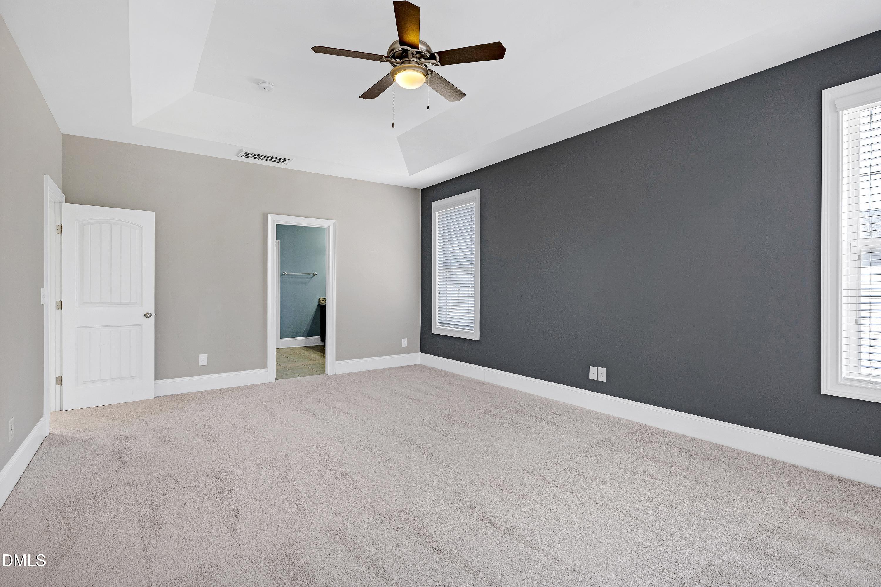 212 Mystic Pine Place Apex, NC 27539 - Photo 24 of 67 a view of an empty room with a window