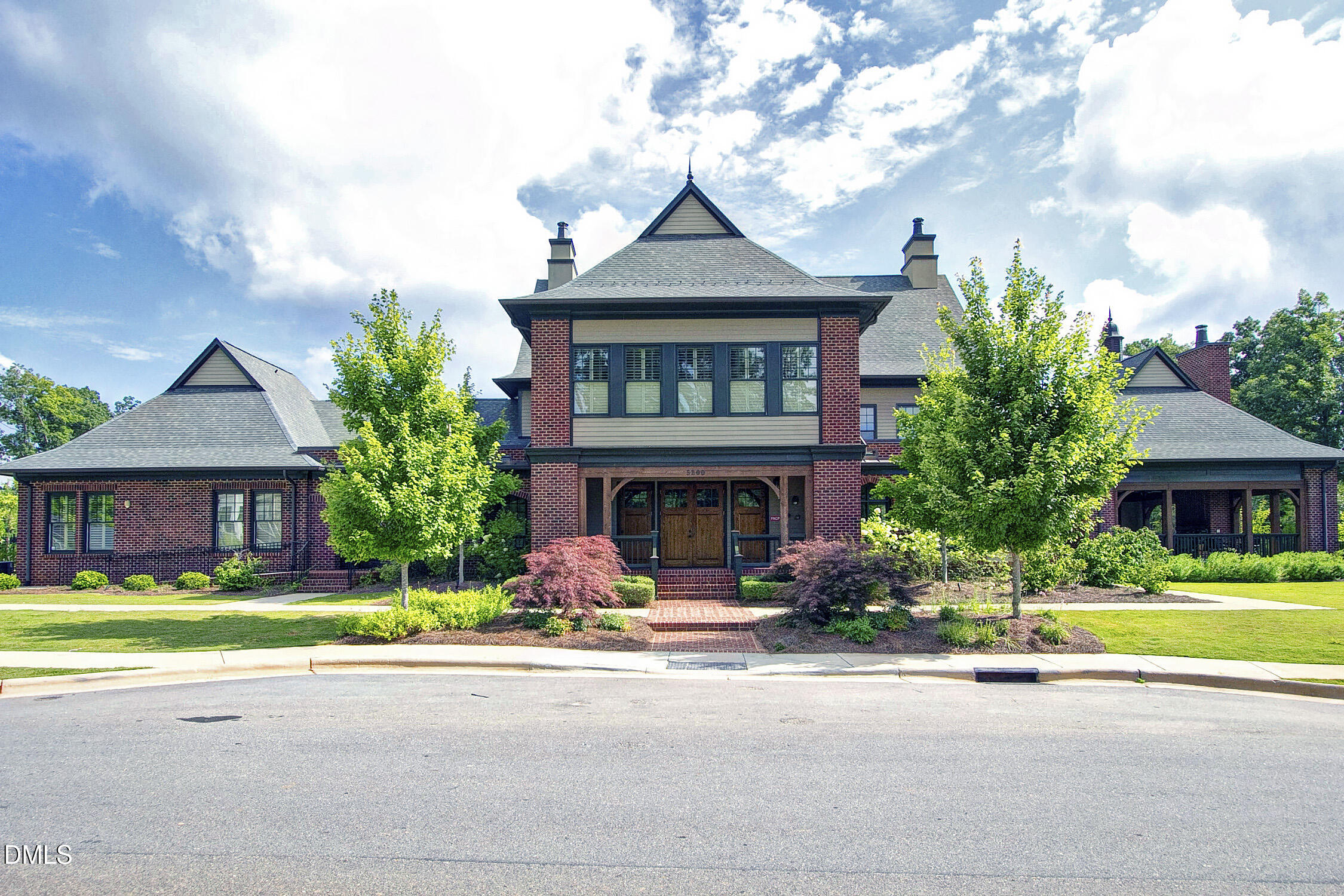 212 Mystic Pine Place Apex, NC 27539 - Photo 54 of 67 a front view of house with yard outdoor seating and garage
