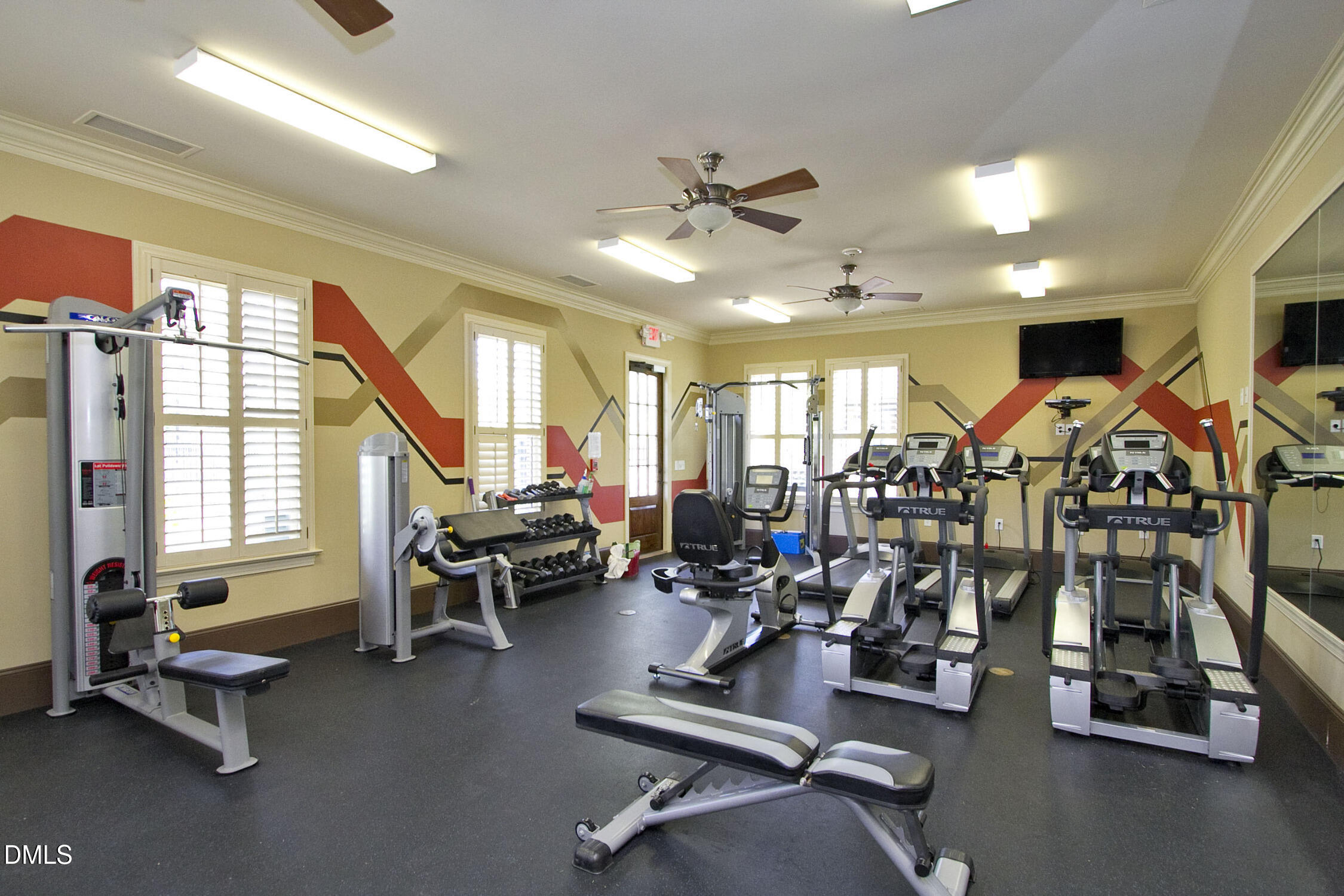 212 Mystic Pine Place Apex, NC 27539 - Photo 58 of 67 a view of a room with gym equipment