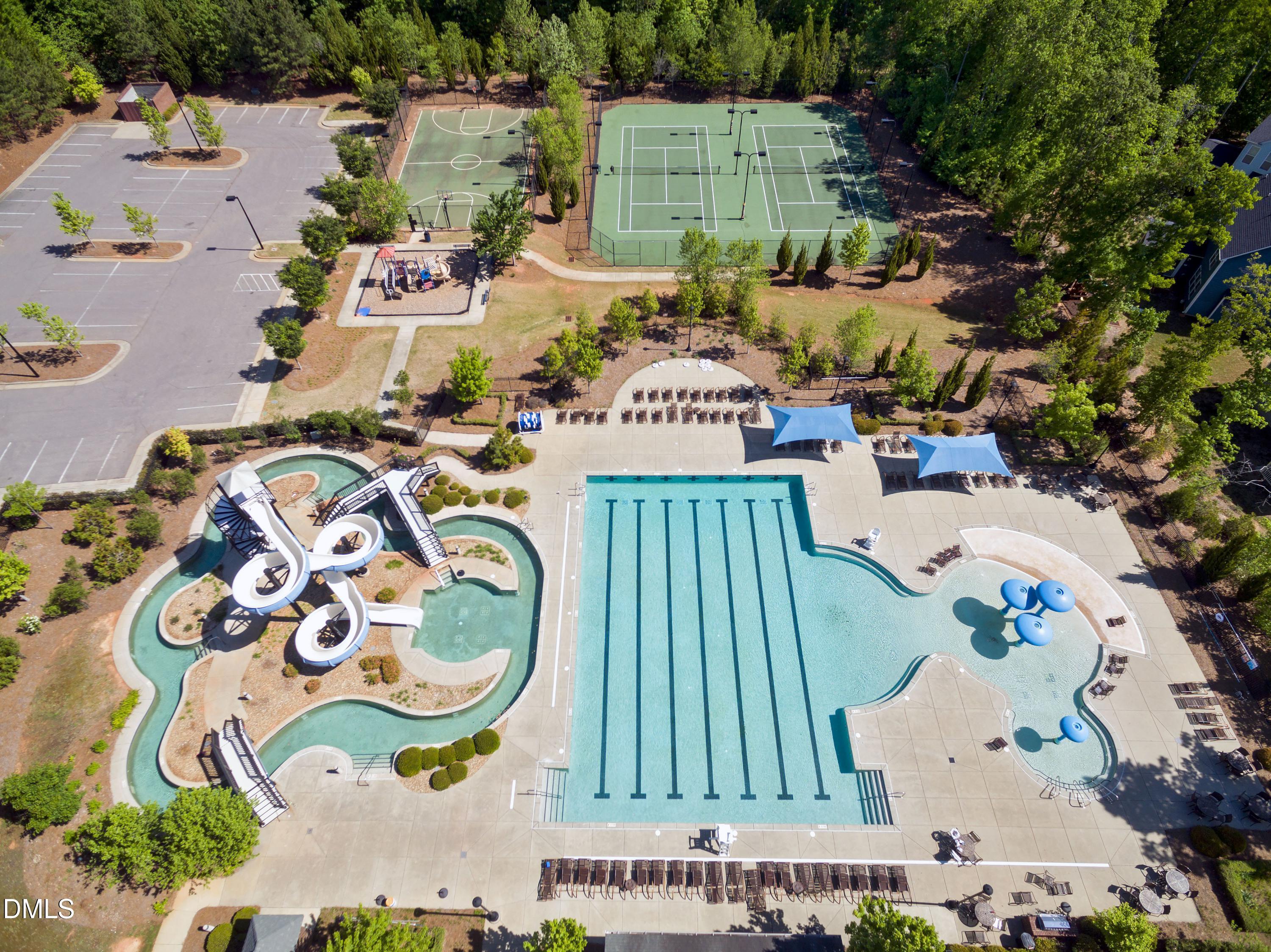 212 Mystic Pine Place Apex, NC 27539 - Photo 64 of 67 an aerial view of a swimming pool and outdoor space