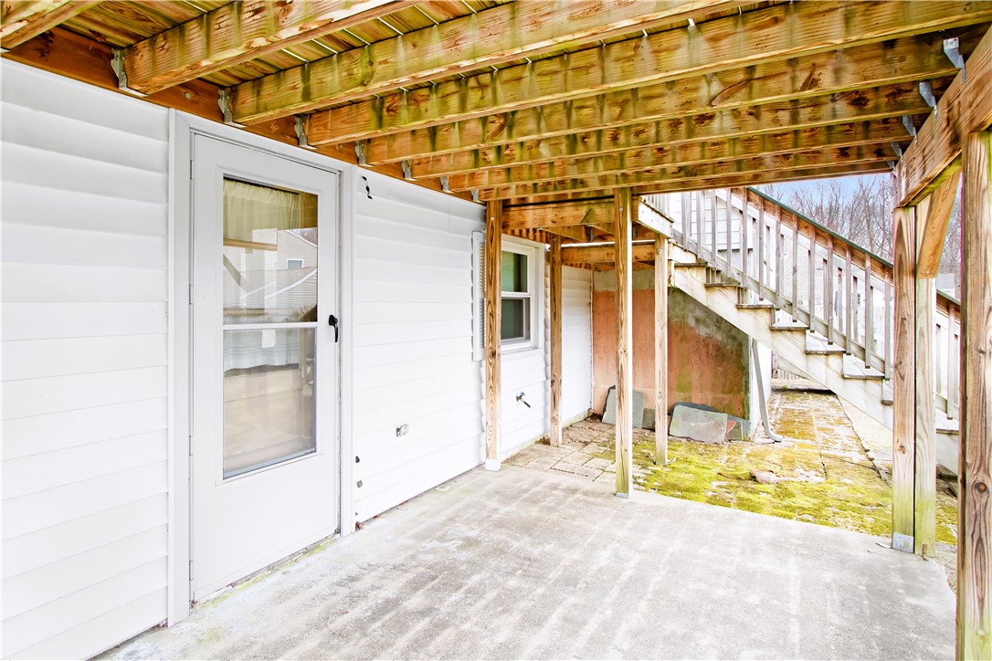 25 Caverly Street Warwick, RI 02886 - Photo 19 of 26 under deck. walk out basement