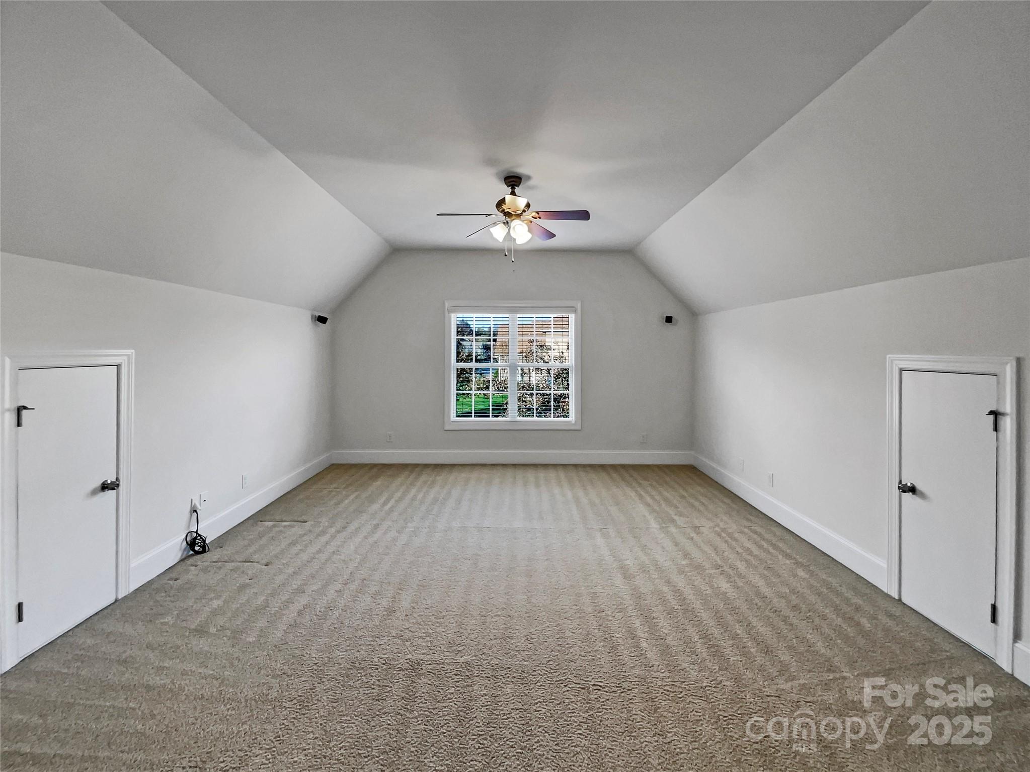 6615 Springs Mill Road Charlotte, NC 28277 - Photo 18 of 23 wooden floor in an empty room with a window