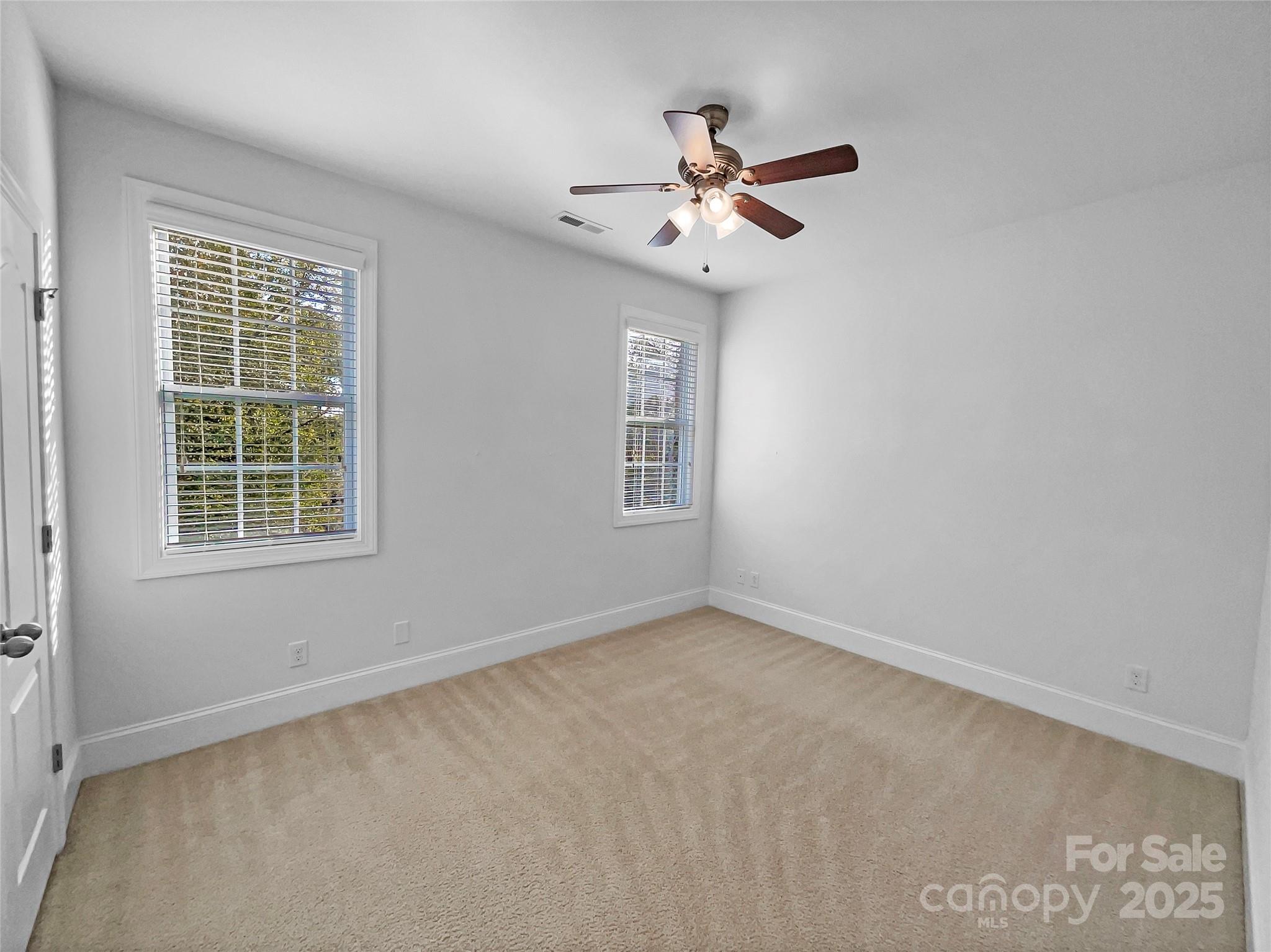 6615 Springs Mill Road Charlotte, NC 28277 - Photo 21 of 23 a view of an empty room with a window