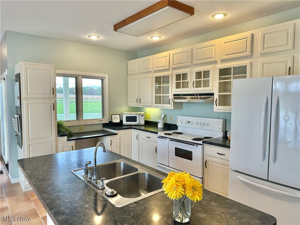 6047 Tallmadge Road Rootstown, OH 44272 - Photo 12 of 50 Kitchen with numerous cabinets