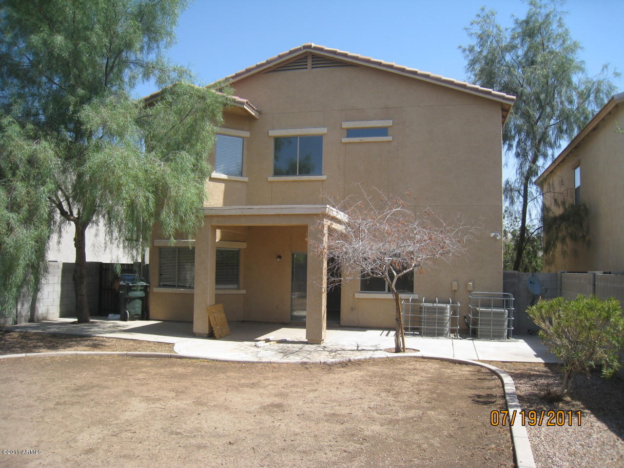 9259 West Belvoir Road Phoenix, AZ 85037 - Photo 9 of 10 rear