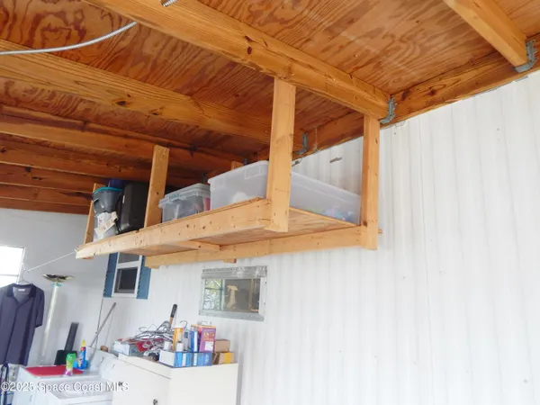 a view of storage and utility room