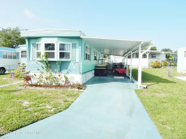 a view of a house with swimming pool