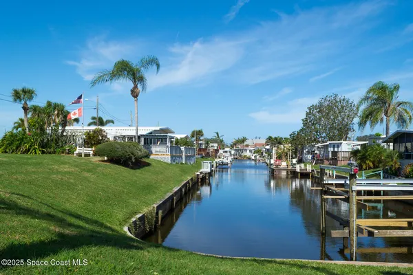 a view of a lake with a big yard