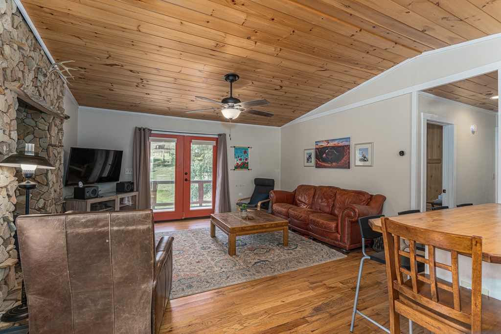 264 Tommy's Lane Murphy, NC 28906 - Photo 11 of 53 a living room with furniture and a flat screen tv