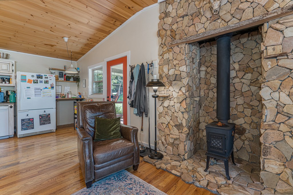264 Tommy's Lane Murphy, NC 28906 - Photo 15 of 53 a living room with furniture and a fireplace