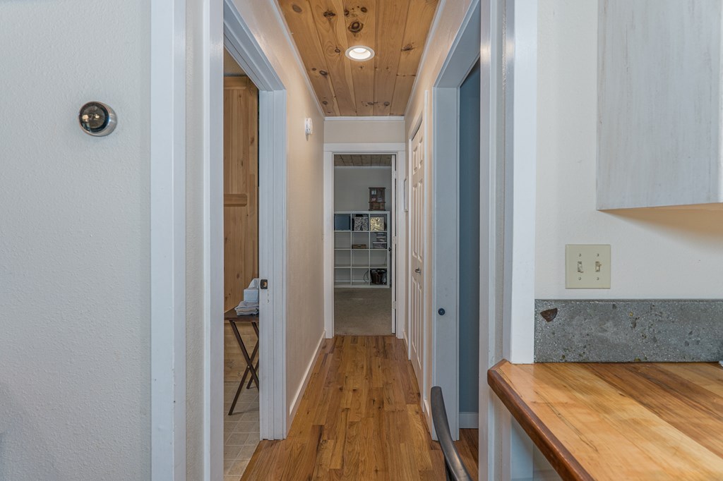 264 Tommy's Lane Murphy, NC 28906 - Photo 19 of 53 a view of a hallway with wooden floor and staircase