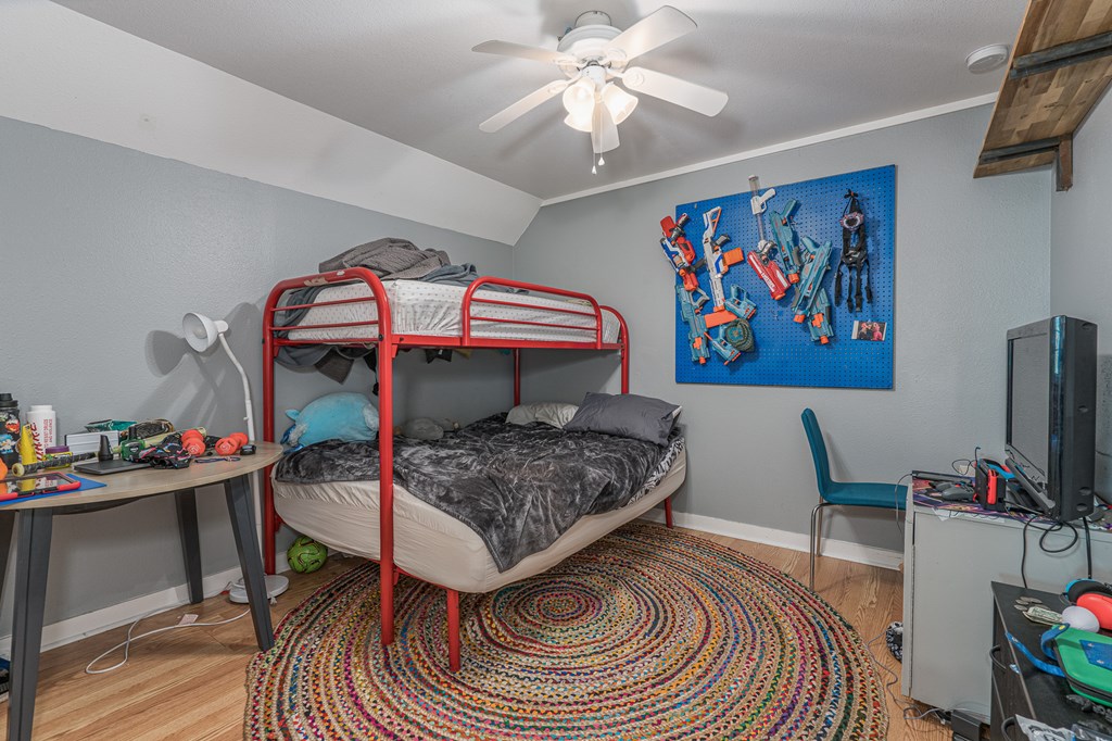 264 Tommy's Lane Murphy, NC 28906 - Photo 34 of 53 a bedroom with a bed and a flat screen tv