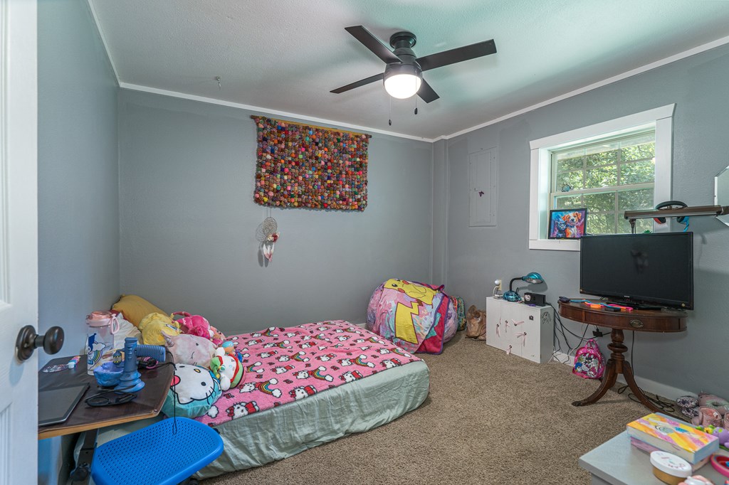 264 Tommy's Lane Murphy, NC 28906 - Photo 35 of 53 a bedroom with a bed and a window