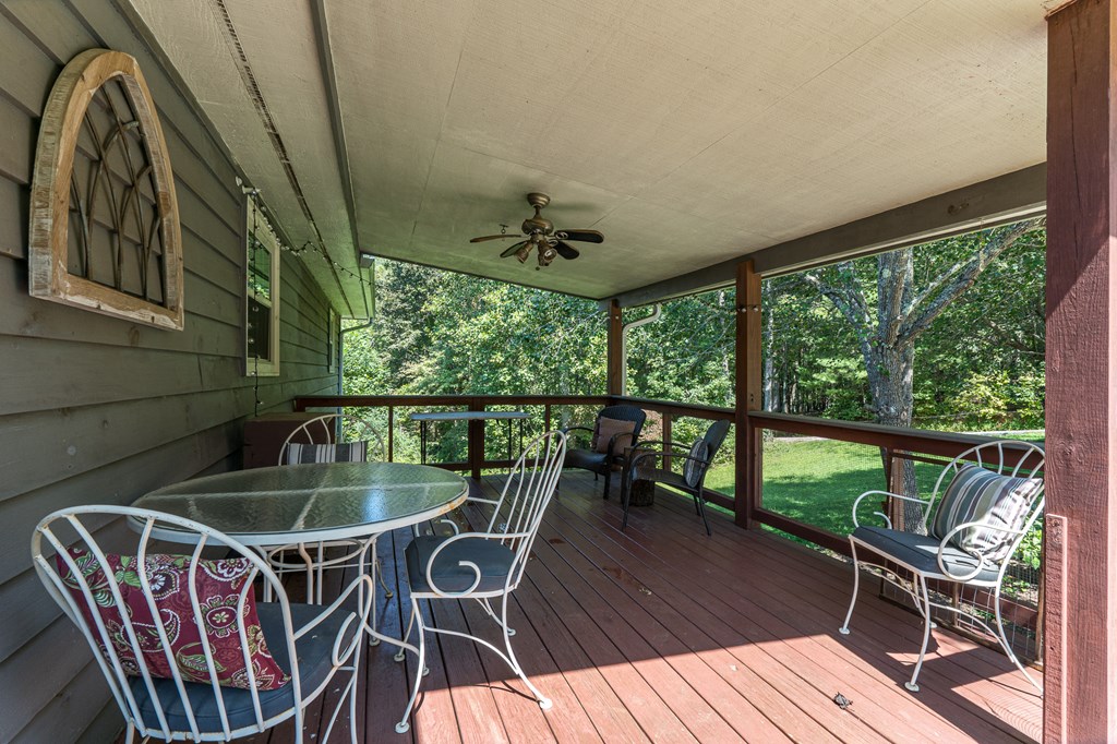 264 Tommy's Lane Murphy, NC 28906 - Photo 6 of 53 a view of a chairs and table in the balcony