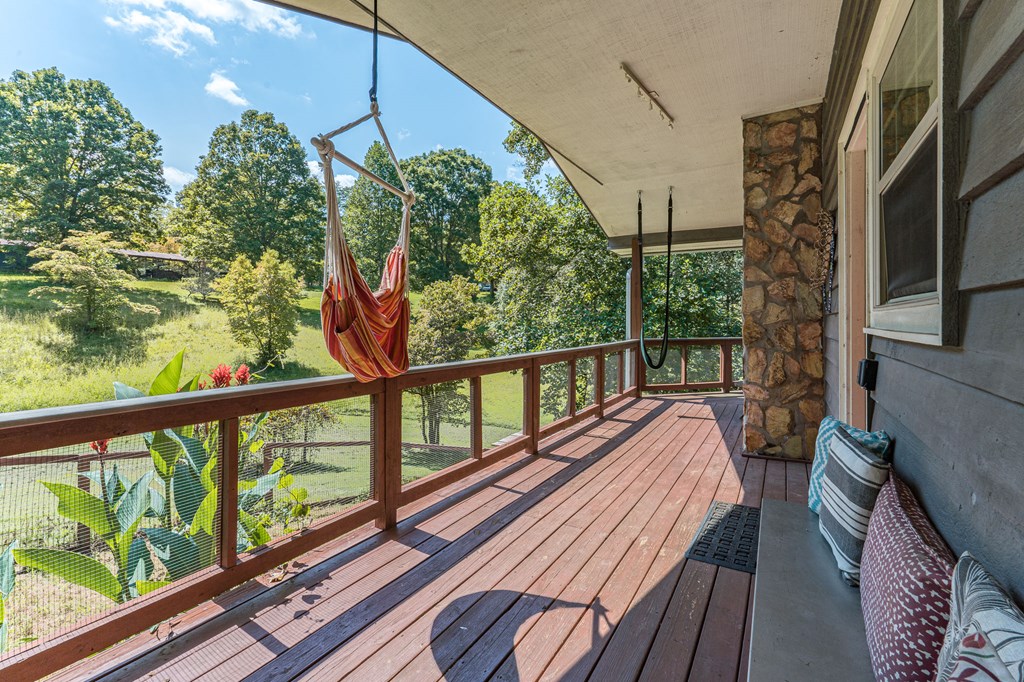264 Tommy's Lane Murphy, NC 28906 - Photo 7 of 53 a view of balcony with wooden floor