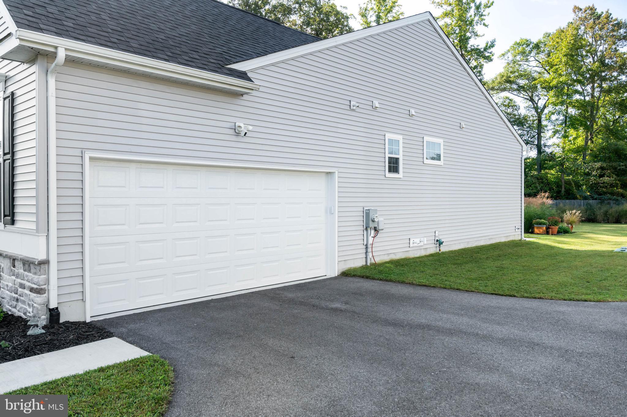 26503 Spring Haven Road Milton, DE 19968 - Photo 29 of 37 The two car garage has exceptional storage