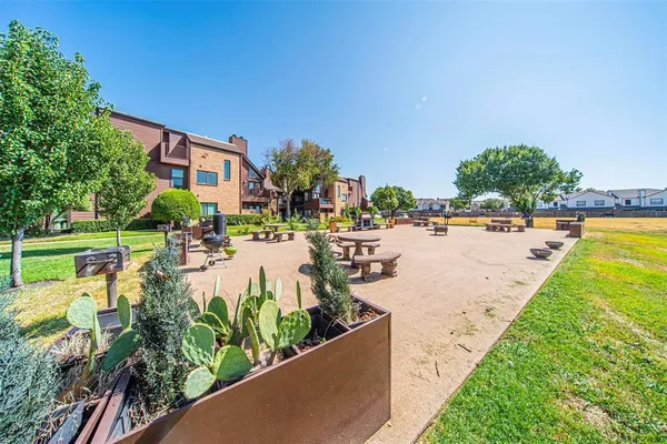 a view of a swimming pool and lounge chair