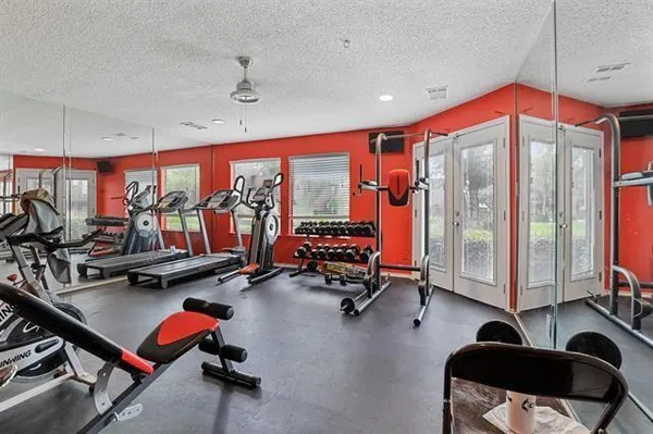 a view of a room with gym equipment