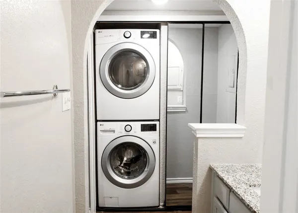 a utility room with dryer and washer