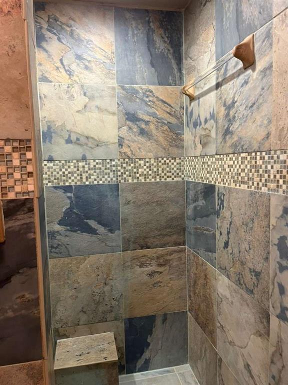 417 Greenfield Road Winter Haven, FL 33884 - Photo 14 of 15 a bathroom with a shower