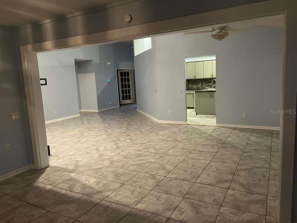 417 Greenfield Road Winter Haven, FL 33884 - Photo 4 of 15 a view of an empty room and fire place