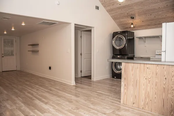 a view of a storage & utility room with a window