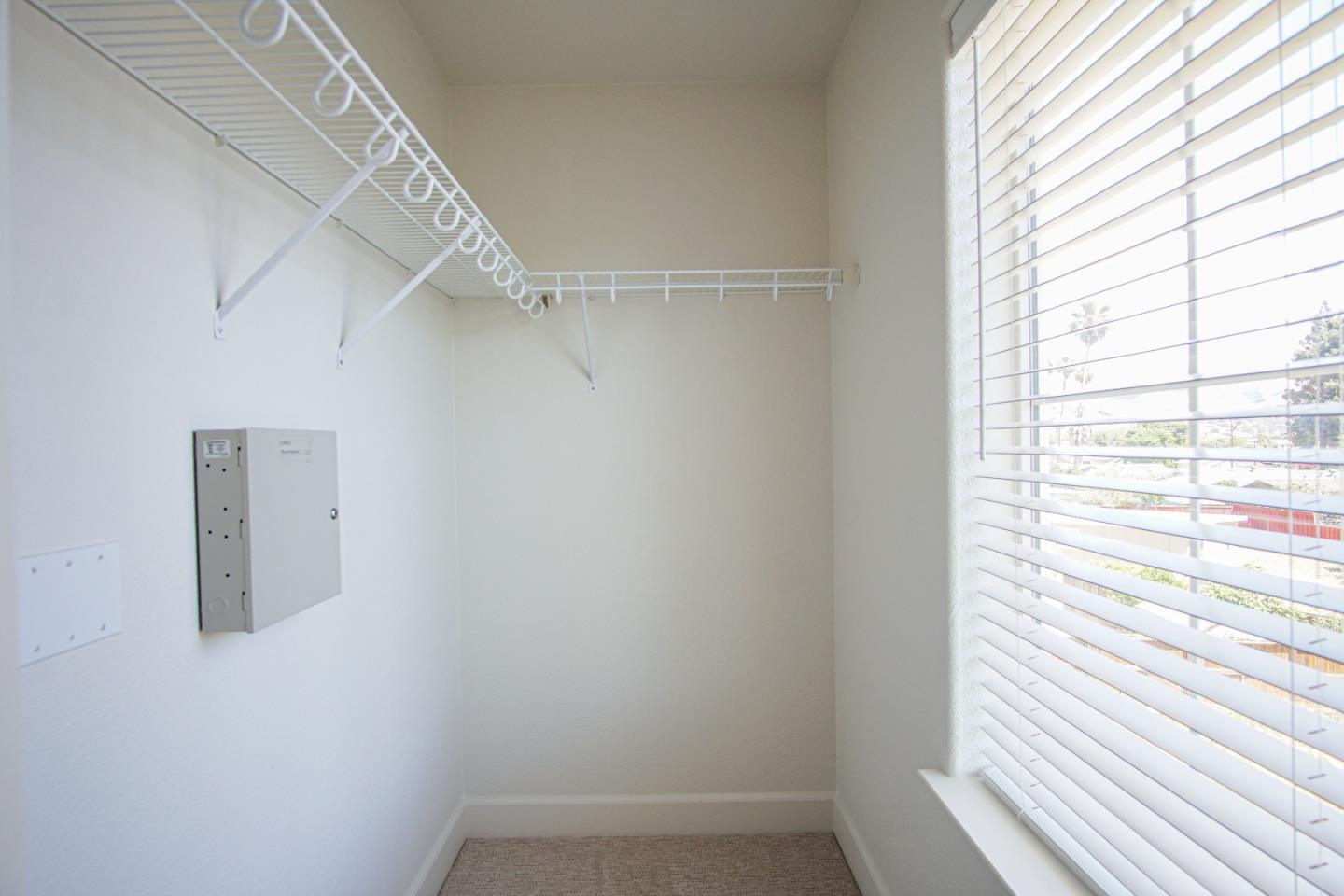 3906 Borgo Common Fremont, CA 94538 - Photo 12 of 21 a view of a hallway with a window