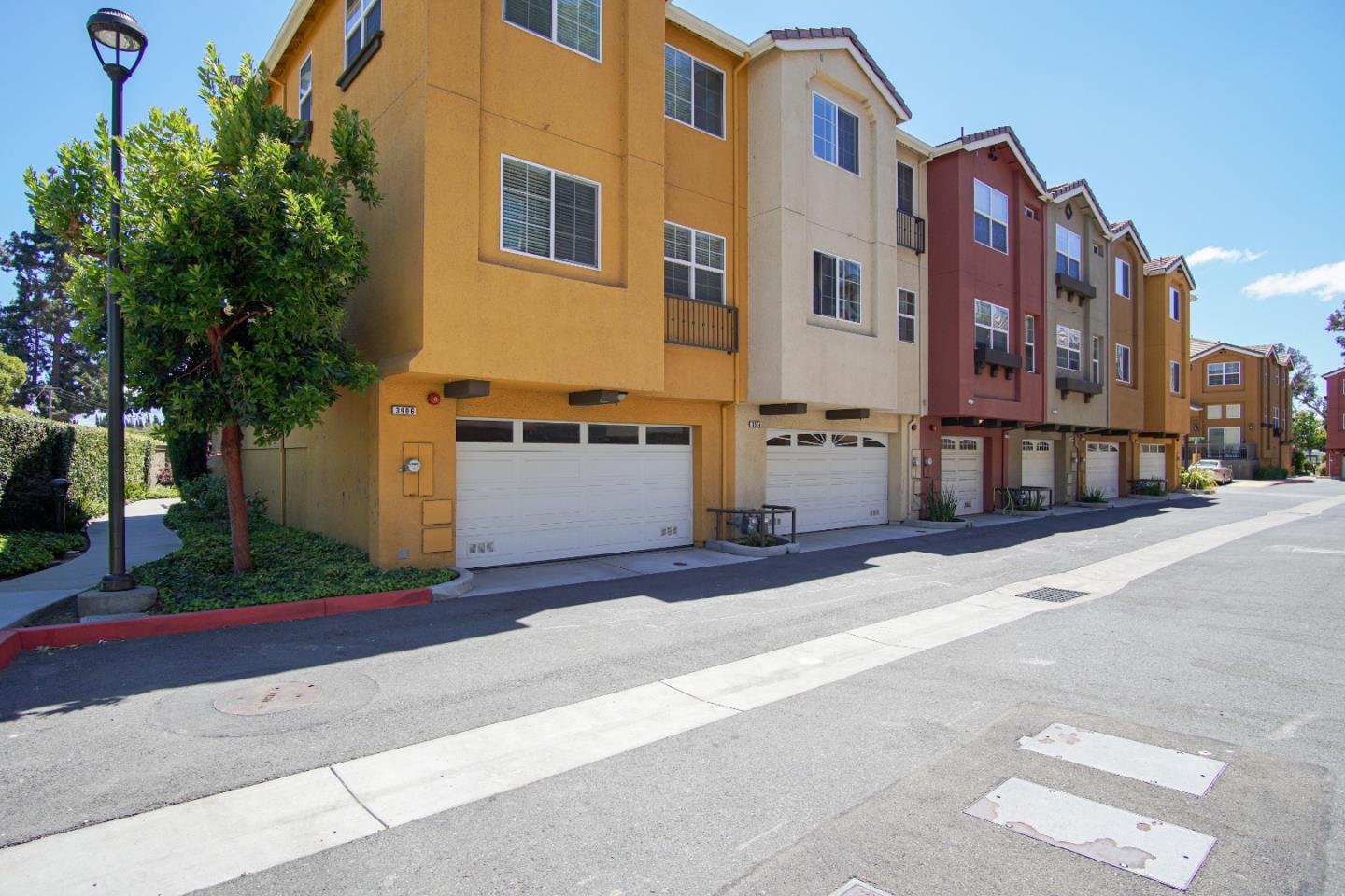 3906 Borgo Common Fremont, CA 94538 - Photo 19 of 21 a view of a street with a building