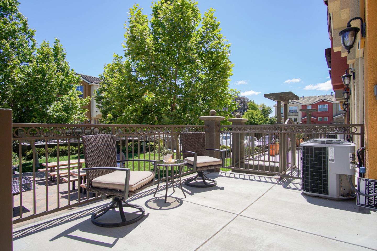 3906 Borgo Common Fremont, CA 94538 - Photo 2 of 21 a view of balcony with wooden floor outdoor seating and city view