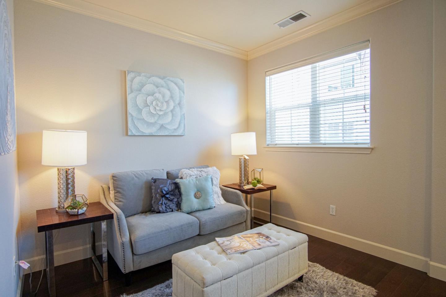 3906 Borgo Common Fremont, CA 94538 - Photo 5 of 21 a living room with furniture and a window