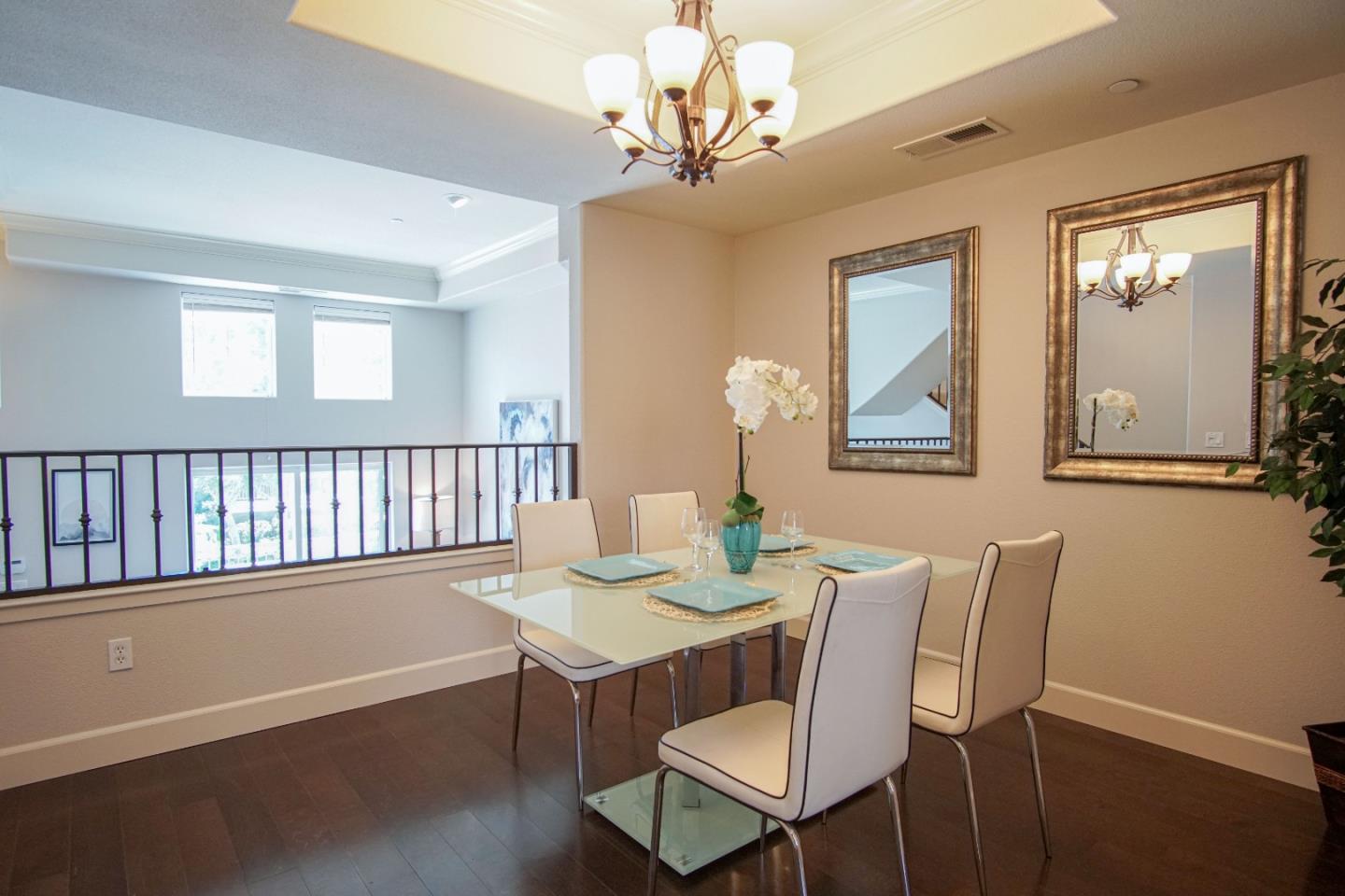 3906 Borgo Common Fremont, CA 94538 - Photo 9 of 21 a view of a dining room with furniture window and wooden floor