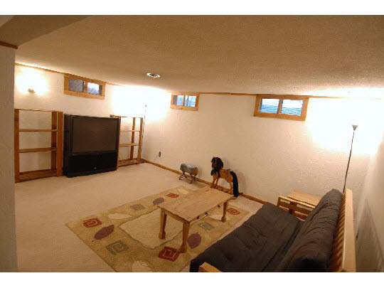 4224 Pinecrest Road Rockford, IL 61107 - Photo 10 of 11 a bedroom with a bed and a television