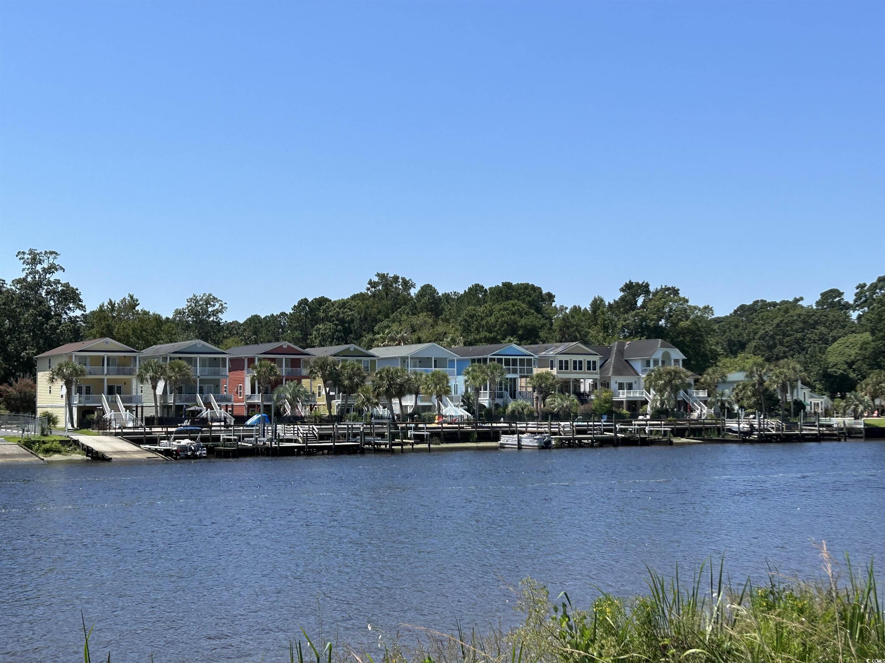 1525 Lanterns Rest Road, Unit 301 Myrtle Beach, SC 29579 - Photo 16 of 34 Property view of water with a dock